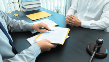 trademark attorney speaking to a client about trademarks and IP laws